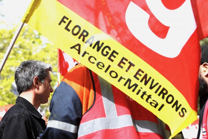 Emmanuel Macron ne veut pas nationaliser ArcelorMittal - Photo by Ludovic MARIN / POOL / AFP